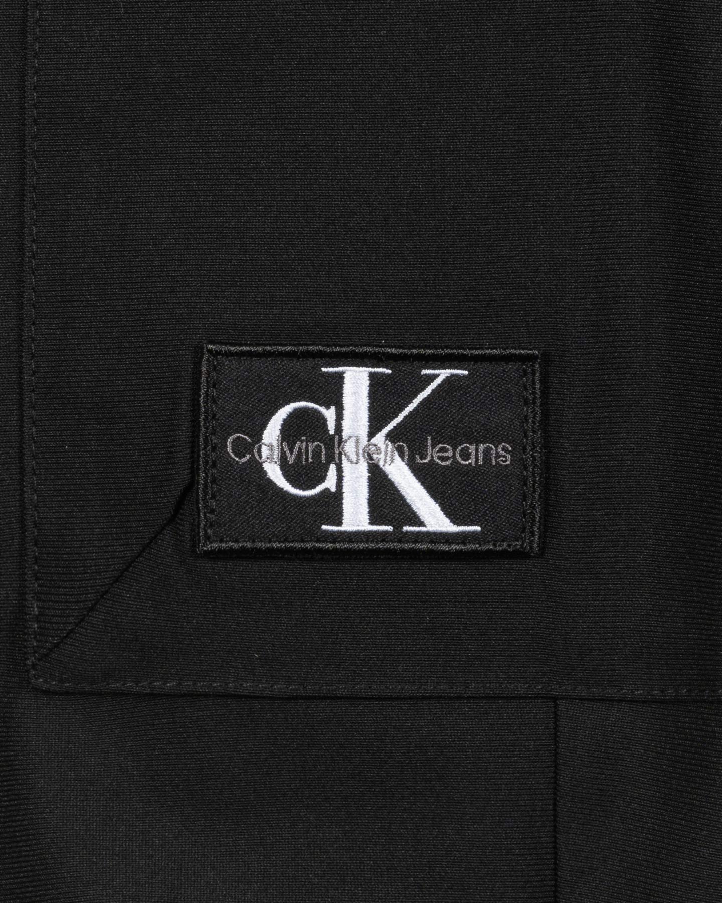 Nohavice Calvin Klein Jeans Parachute Dry Knit Jr 24SMCKIB0IB02079T-BE