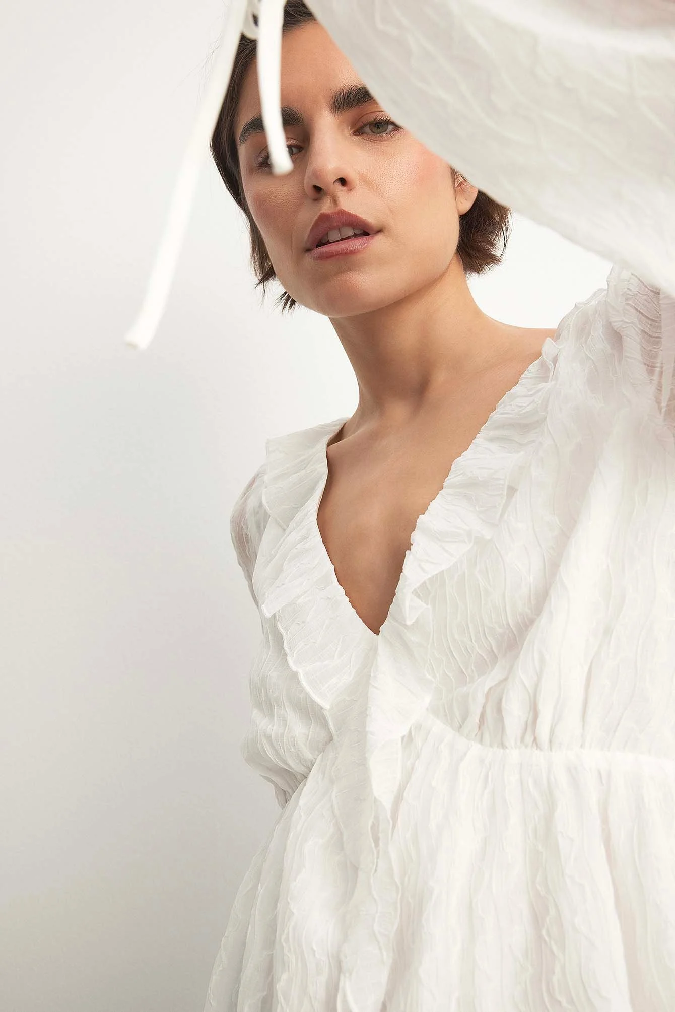 Chiffonbluse mit V-Ausschnitt und Rüschendetail