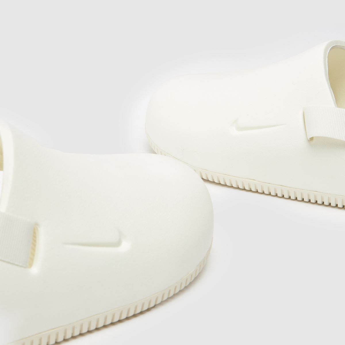 Nike – Calm mule-sandaler i vitt