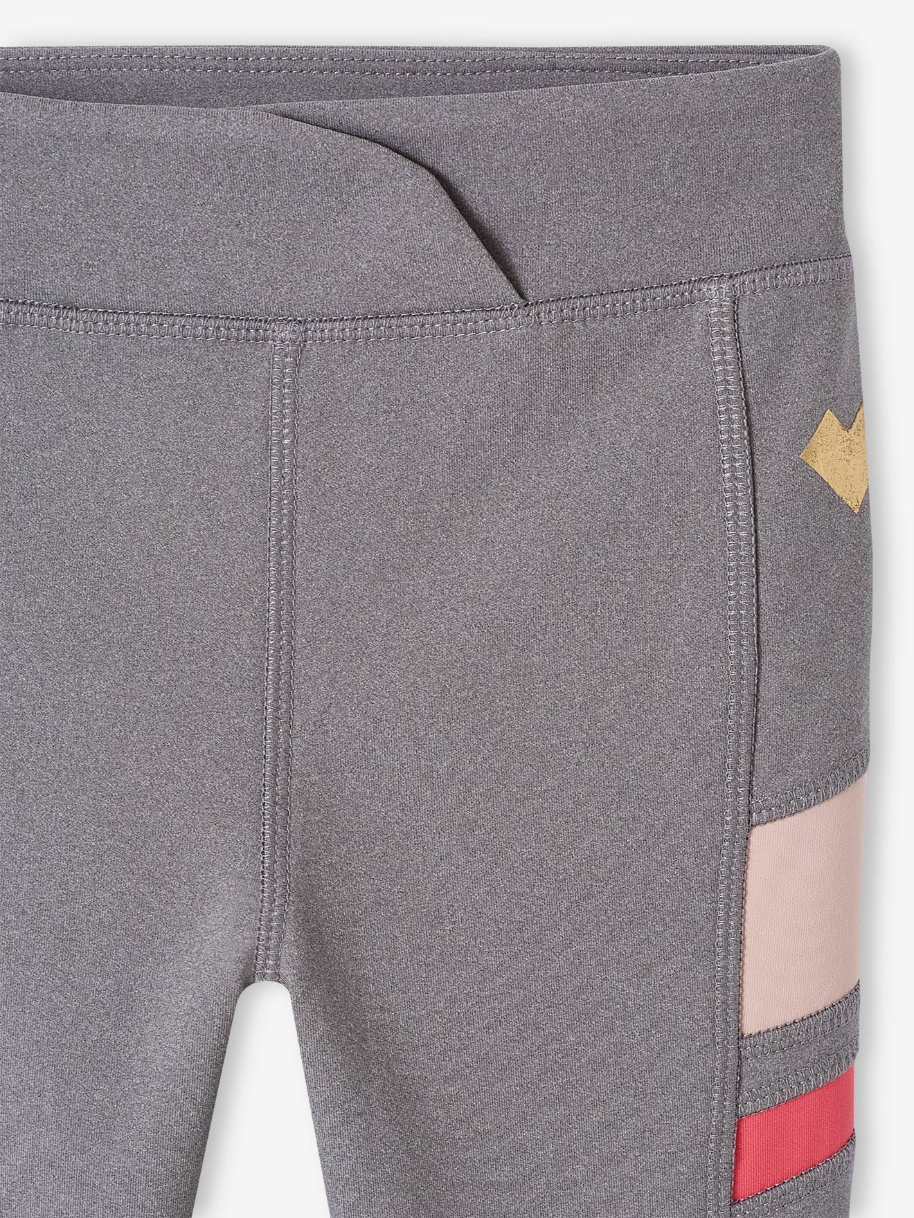 Legging sport en matière technique fille détails côtés fantaisie marine