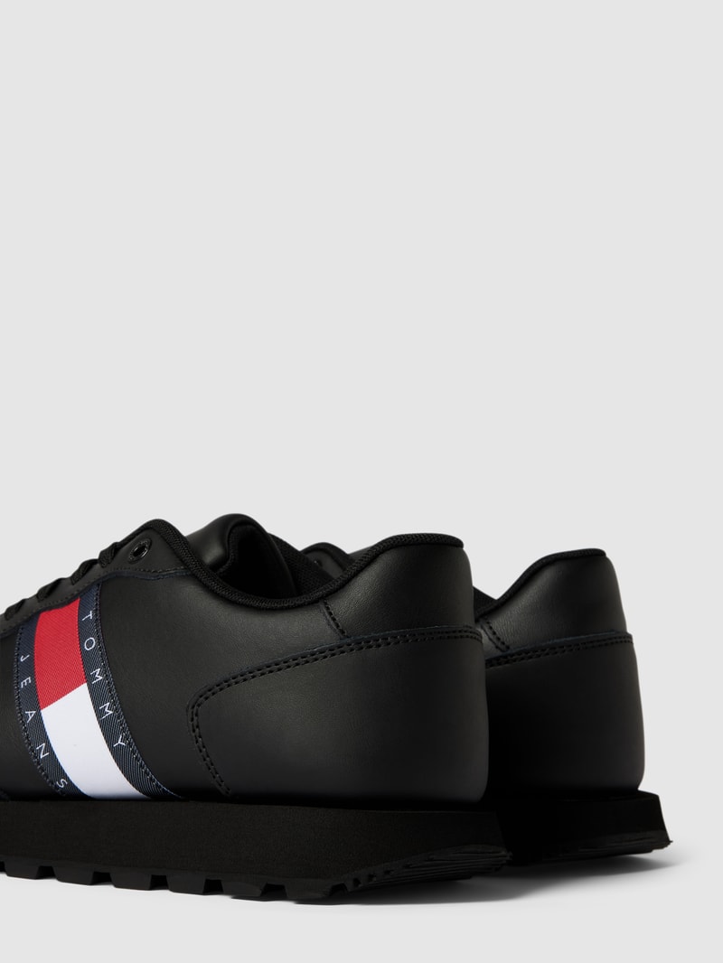 Sneaker mit Label-Details Modell 'TOMMY JEANS LEATHER RUNNE' in schwarz