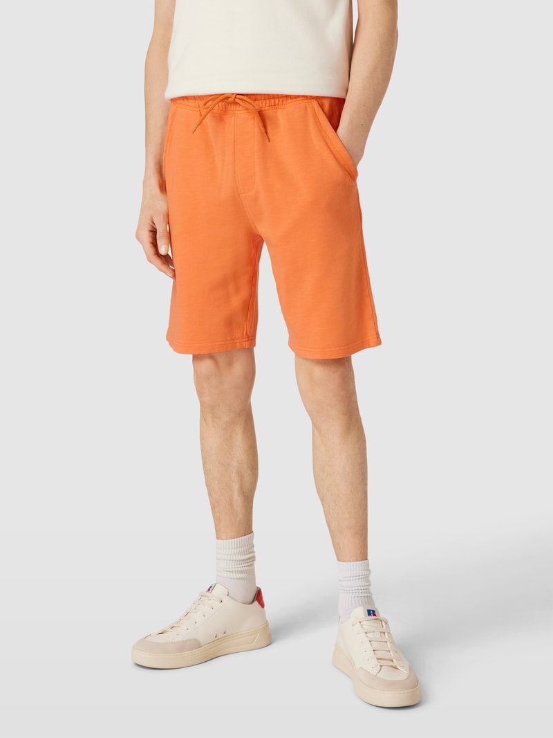 Shorts mit seitlichen Eingrifftaschen in lachs