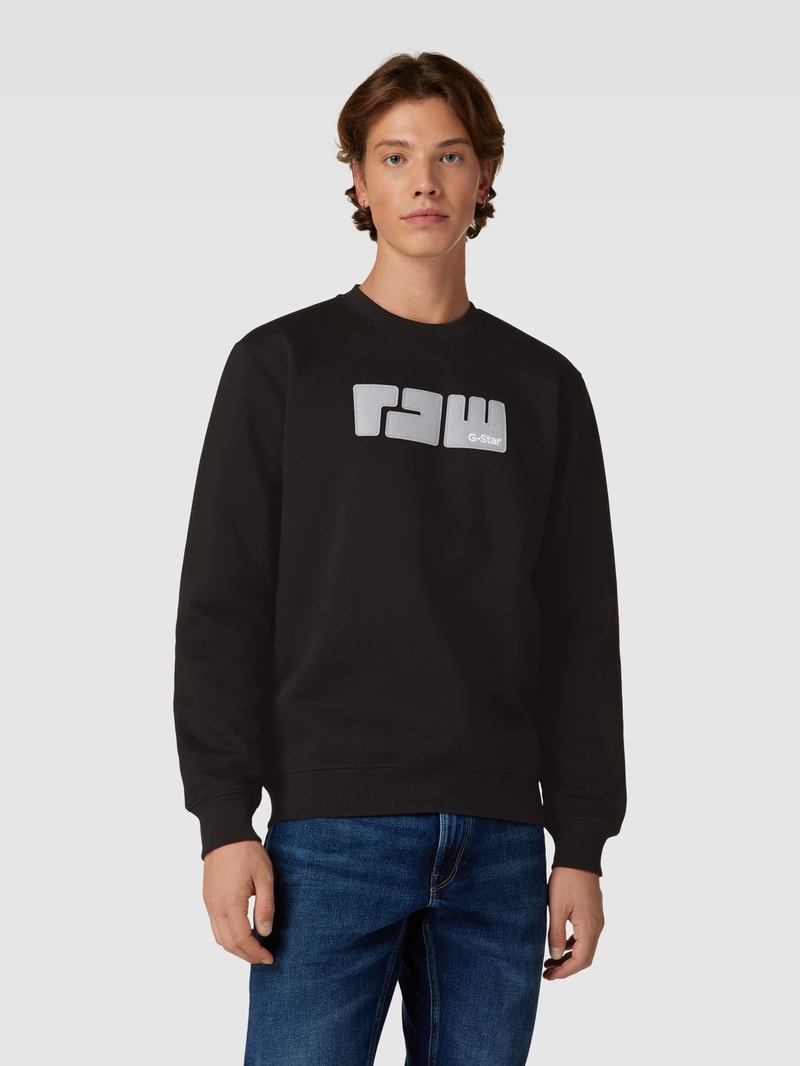 Sweatshirt mit Label-Stitching Modell 'RAW.' in schwarz