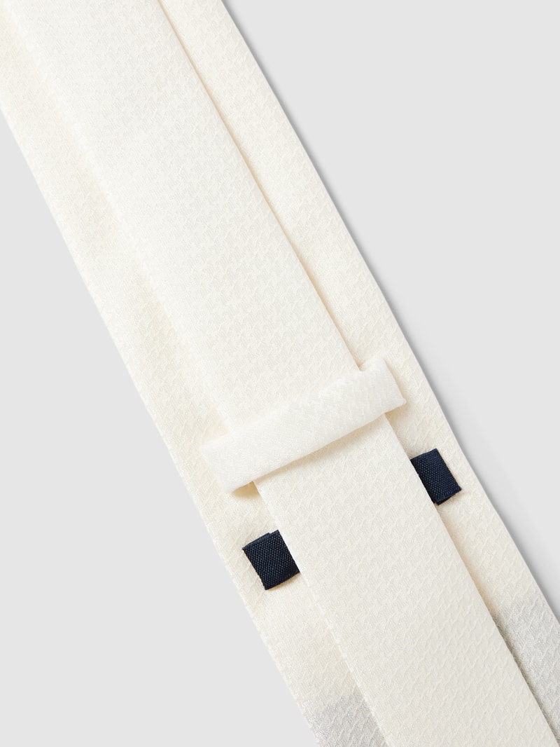 Krawatte mit Allover-Muster in offwhite