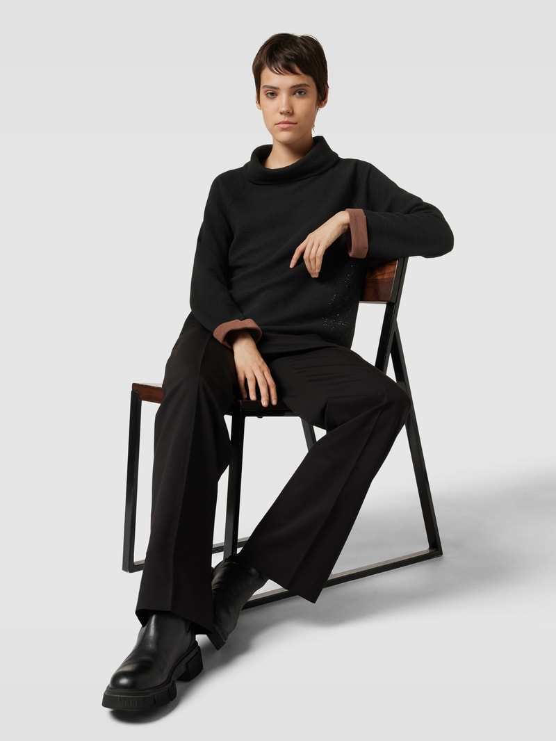 Pullover mit Ziersteinbesatz in schwarz
