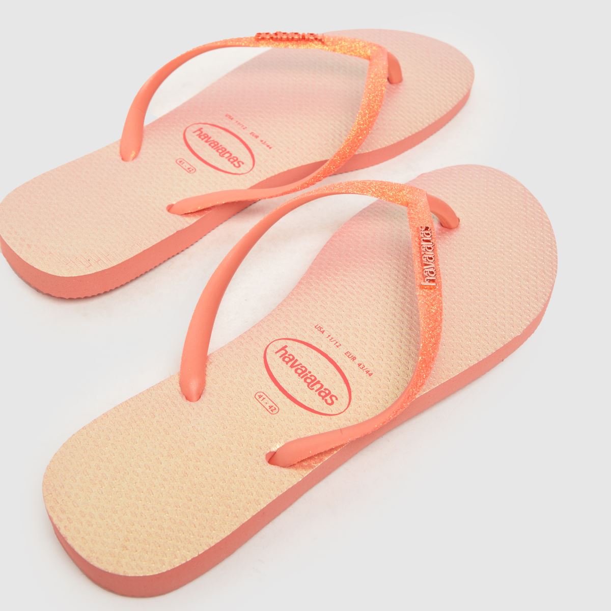 Havaianas – Persikafärgade smala glitter-sandaler med skimrande look