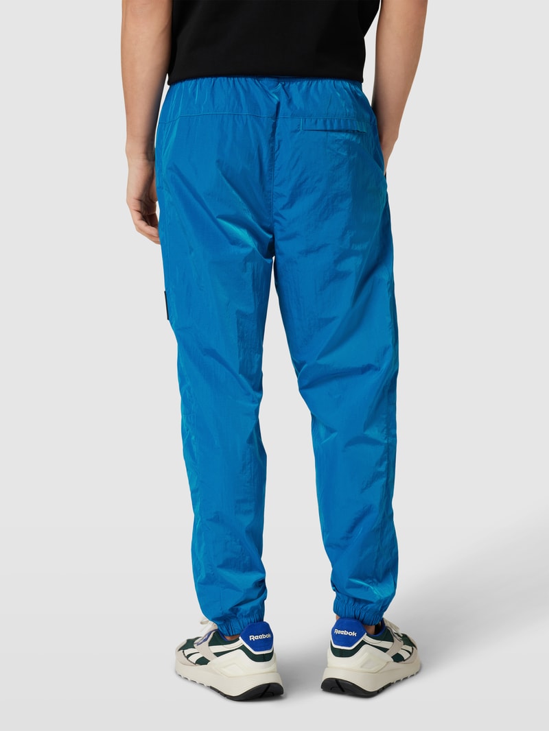 Stoffhose mit elastischen Abschlüssen in royalblau