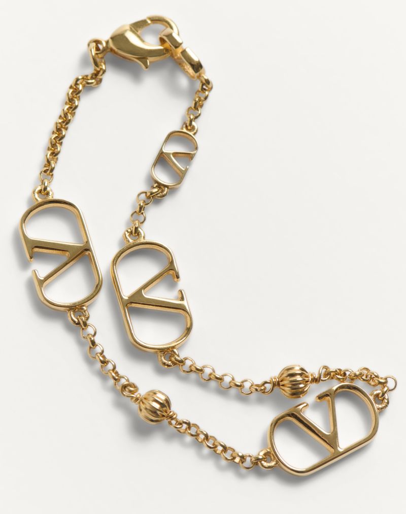 Pulseira de metal com assinatura VLogo