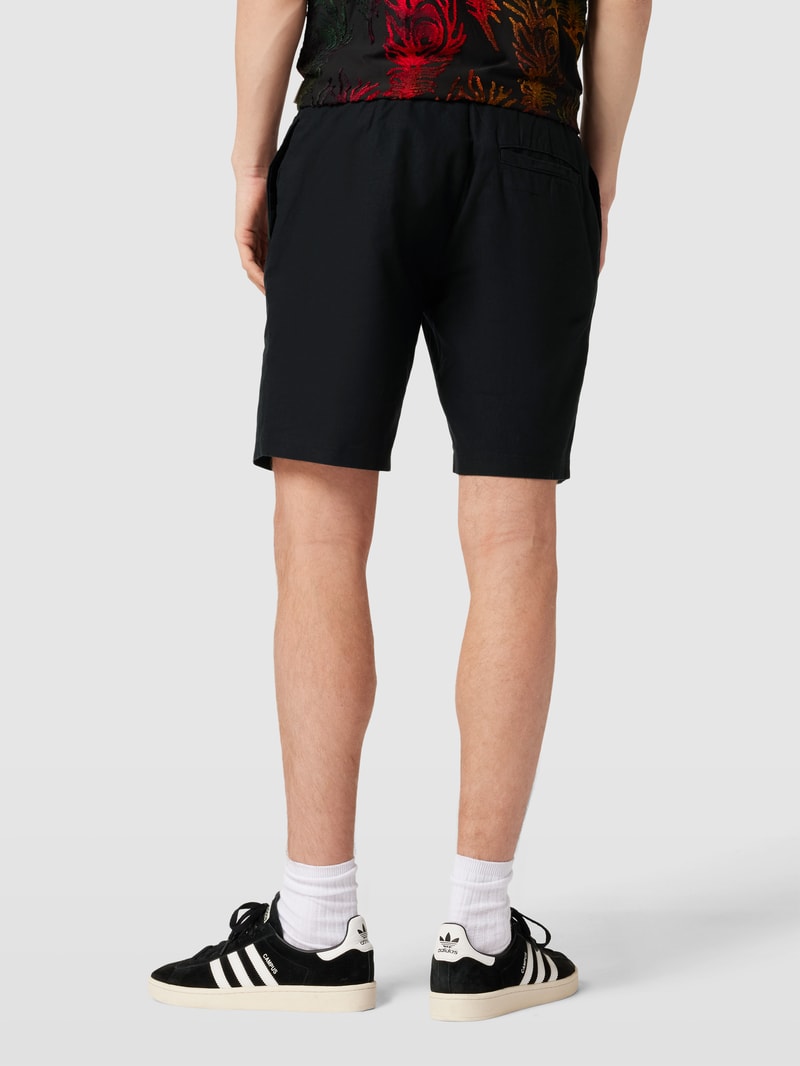 Bermudas aus Baumwolle mit Eingrifftaschen in schwarz