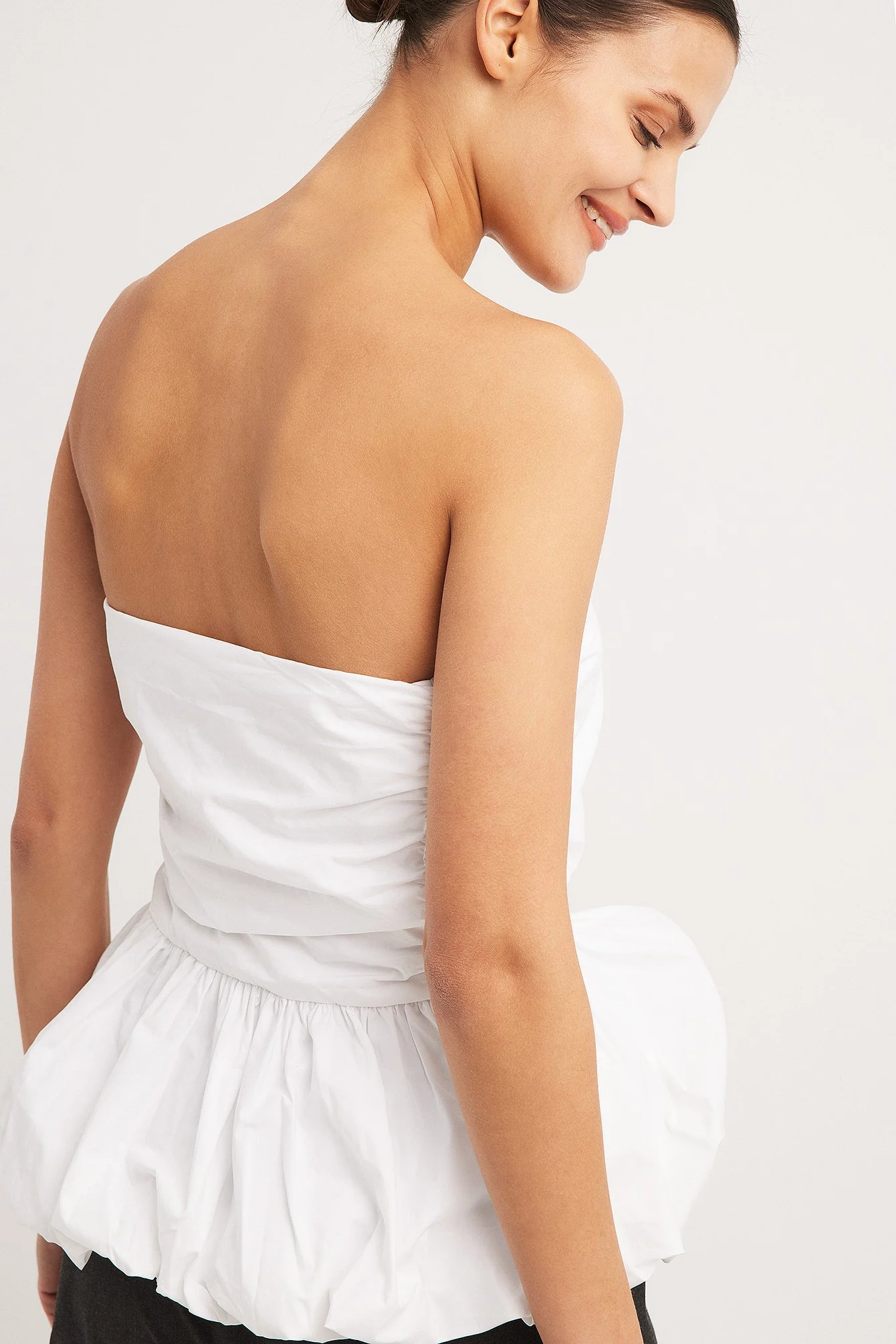 Schulterfreies Peplum-Oberteil
