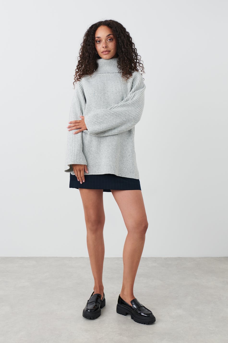 Roll-neck knitted sweater