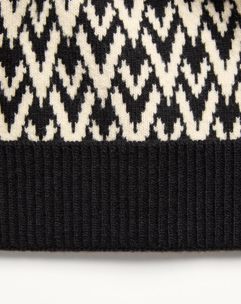 Beanie strikket Toute La V Signature i uld