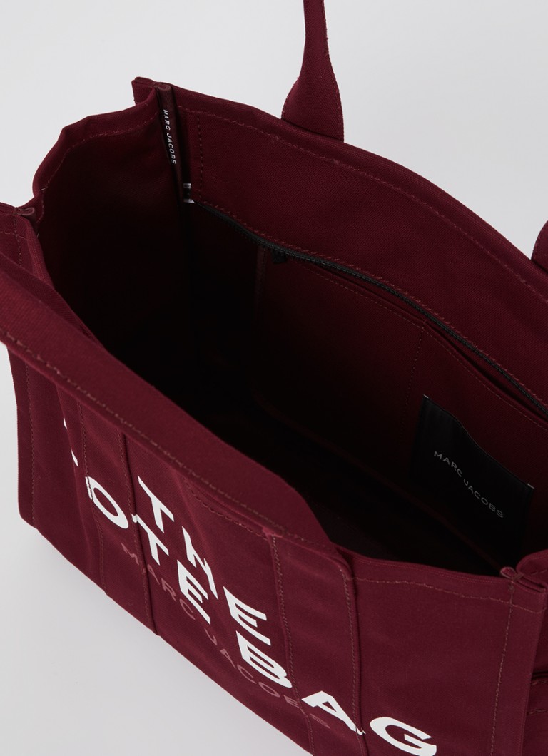 Geantă mare Marc Jacobs din pânză cu logo imprimat.