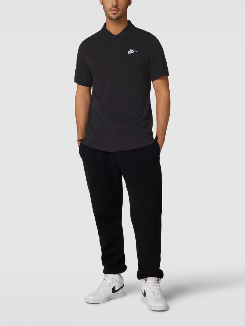 Poloshirt mit Knopfleiste und Logo-Detail in schwarz