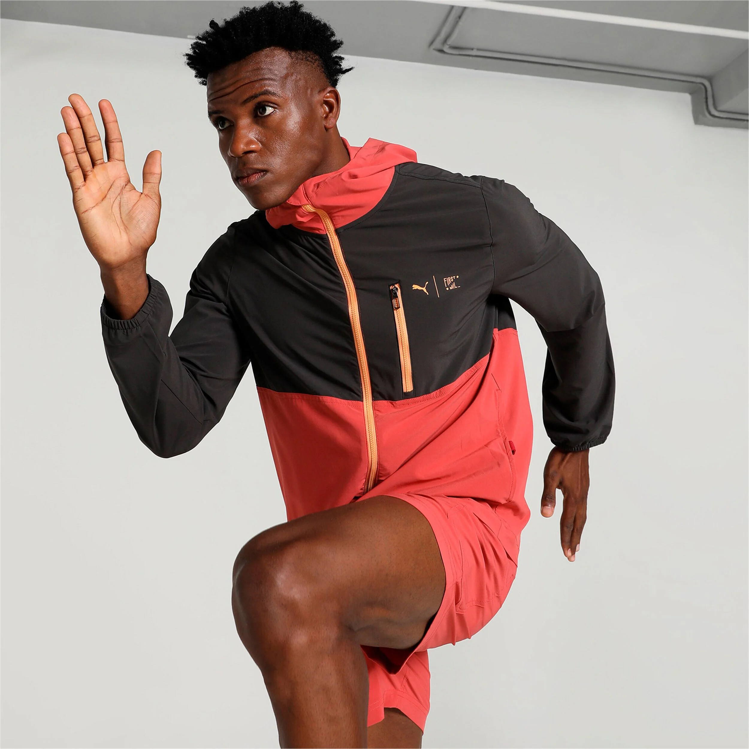 First Mile Woven Laufjacke Herren - Schwarz, Rot