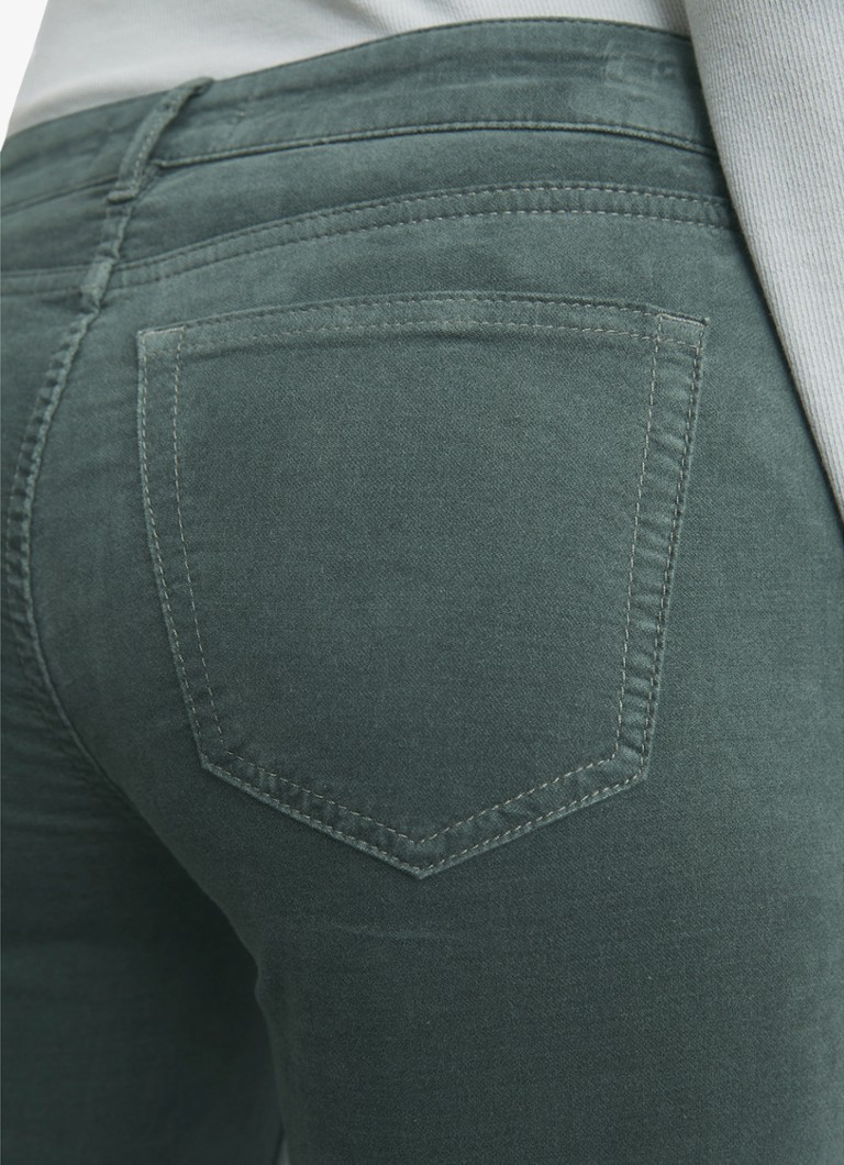 Jean slim taille mi-haute Marc O'Polo en coton biologique délavé.