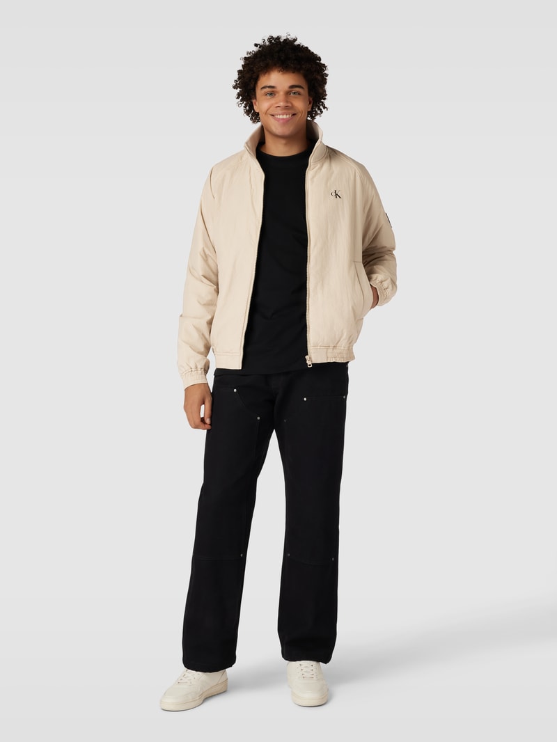 Blouson mit Logo-Print und Eingrifftaschen in beige