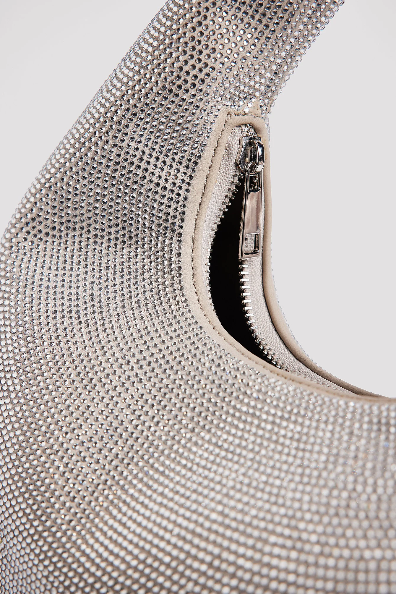 Glitzernde abgerundete Tasche
