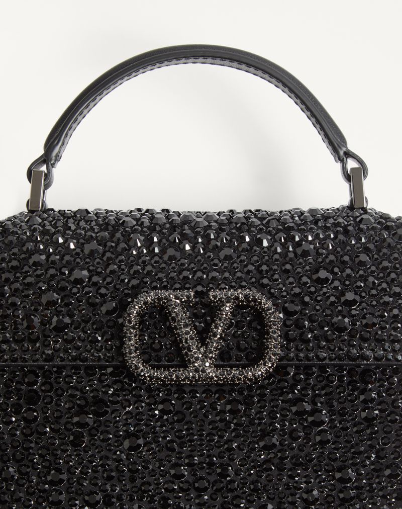 Mini bolsa tiracolo com bordado brilhante