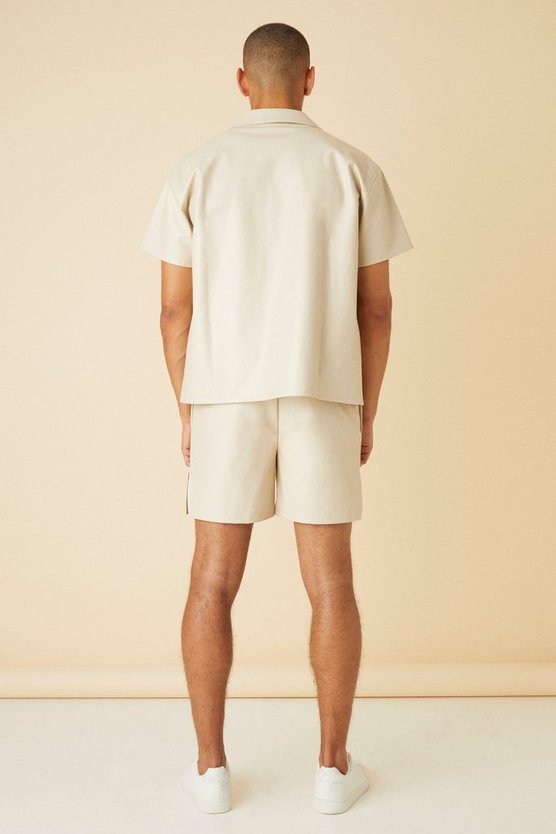 Gespleißte PU-Shorts mit elastischem Bund