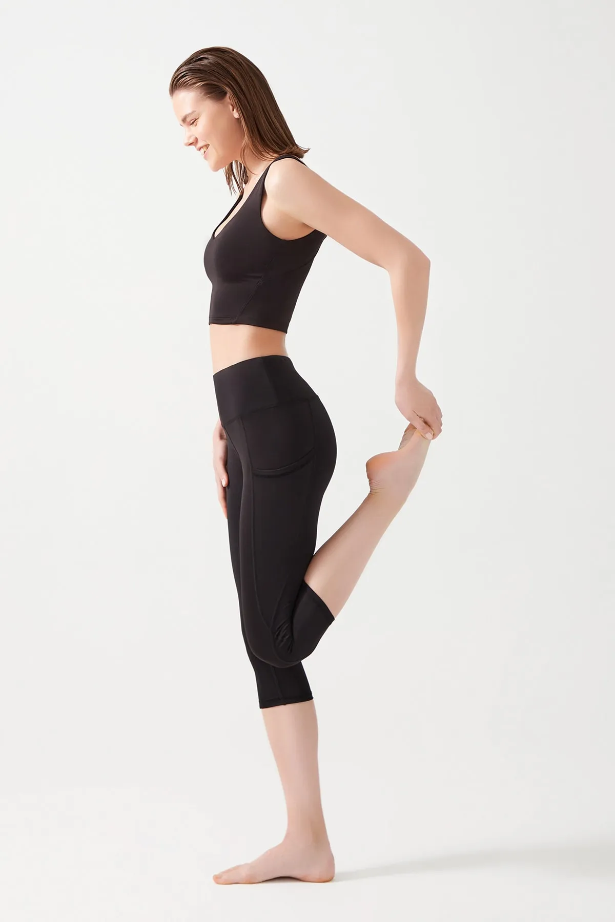 LOS OJOS  Schwarze Damen-Capri-Leggings mit hoher Taille und doppelter Tasche unterhalb des Knies