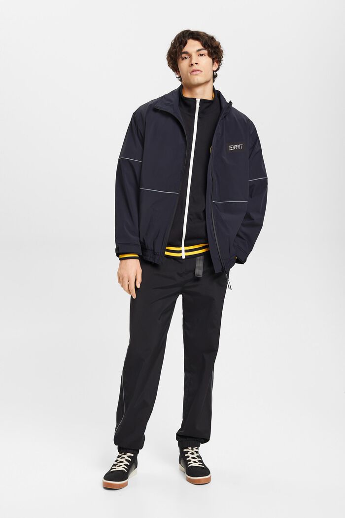 Track Pants mit hohem Bund und schmal zulaufendem Bein