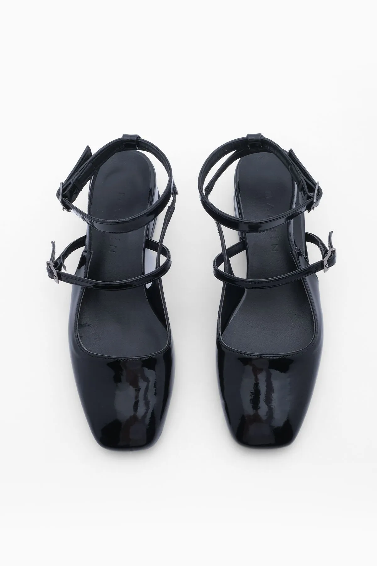 Marjin  Damen-Mary-Jane-Schuhe mit Schutzhelm, quadratischer Zehenpartie und offenem Rücken, kurzer Blockabsatz, Hanse, schwarzes Lackleder