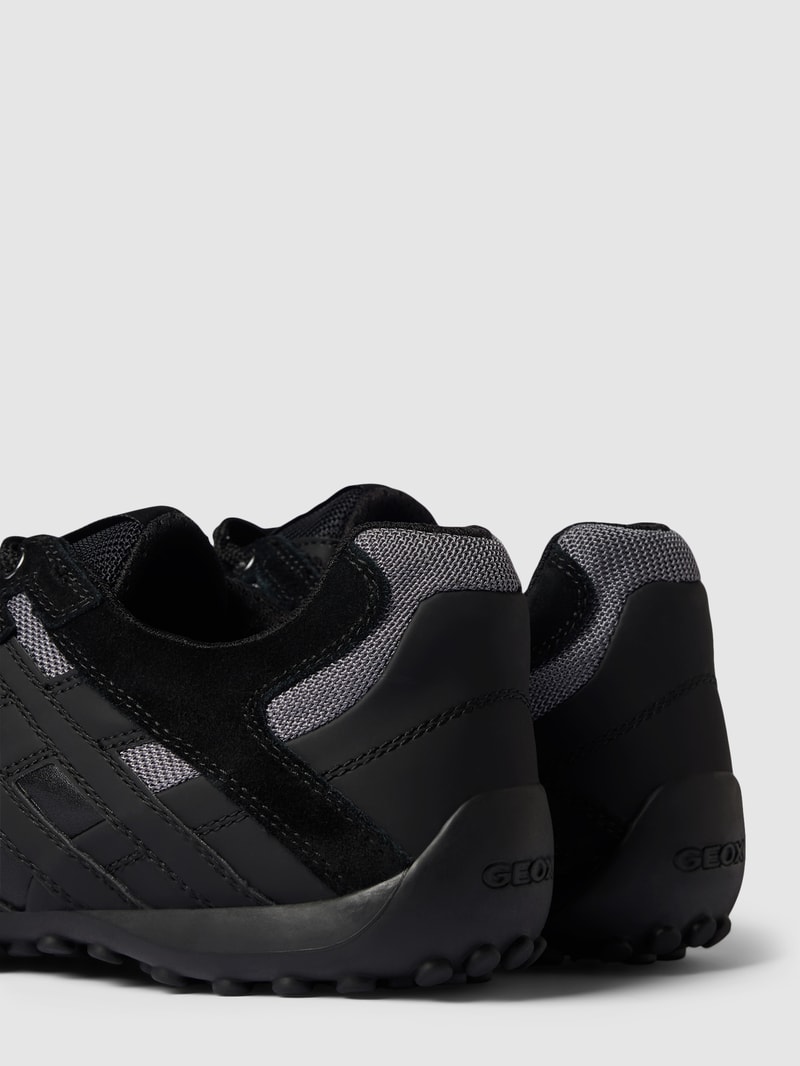 Sneaker mit Kontrastbesatz Modell 'UOMO' in schwarz