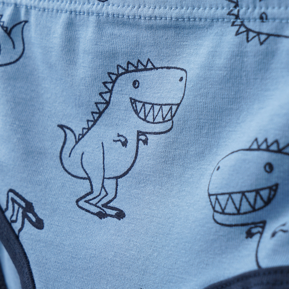 5 Baby Slips in verschiedenen Dessins