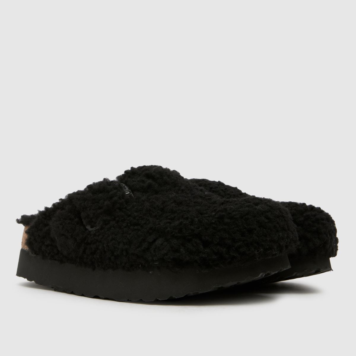 BIRKENSTOCK – Boston – Svarta sandaler med stort spänne i fårskinn