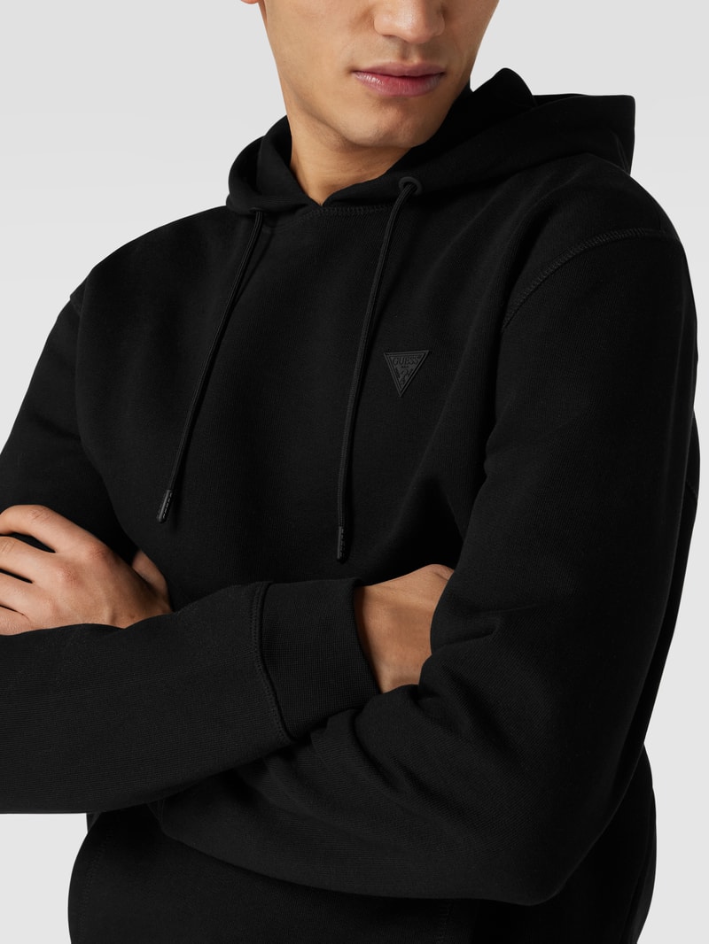 Hoodie mit Logo-Applikation in schwarz