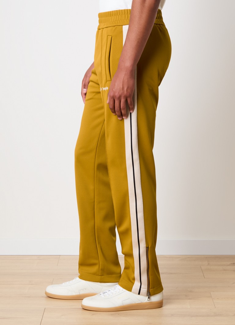 Palm Angels Tapered fit trenirke z logotipom in steekzakken