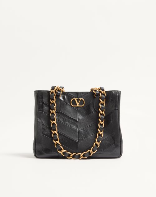 Bolsa de compras pequena Valentino Garavani Laseine em napa com estampa chevron.