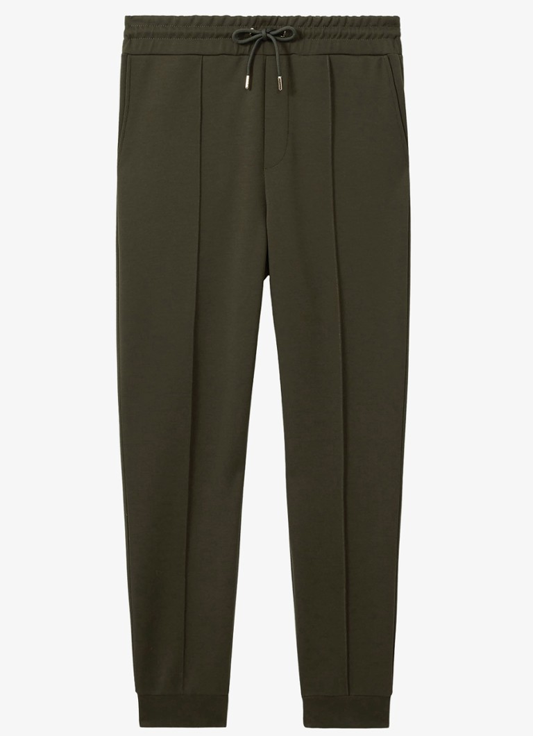 Pantaloni de trening conici Reiss Premier cu buzunare cusute.