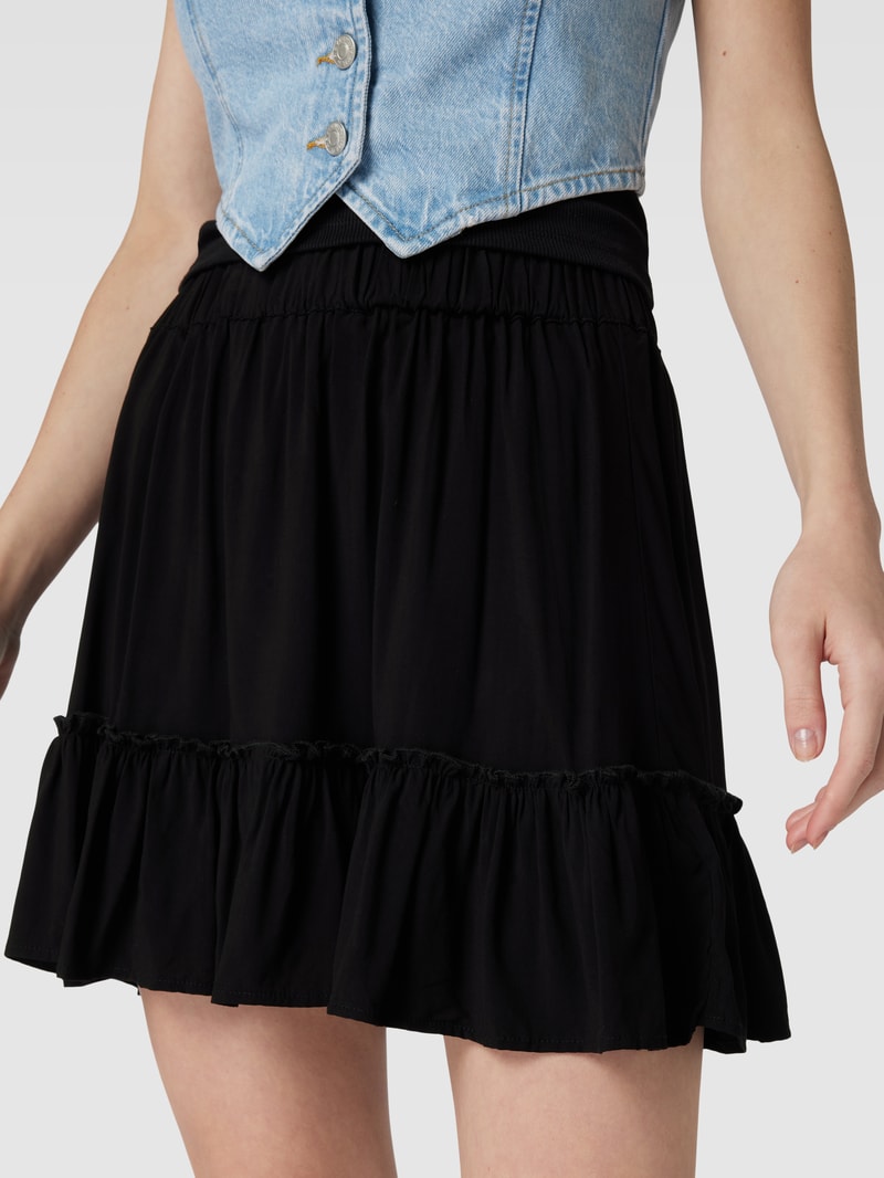 Minirock mit floralem Muster in schwarz