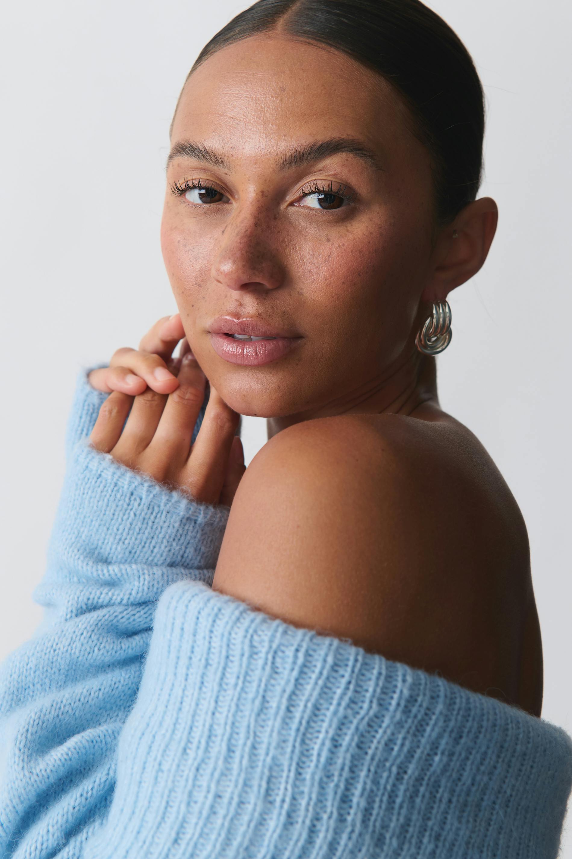 Knitted off shoulder sweater