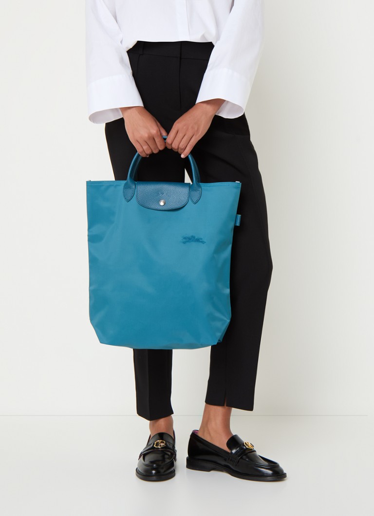 Geantă verde Longchamp Le Pliage, mărimea M, cu detalii din piele.