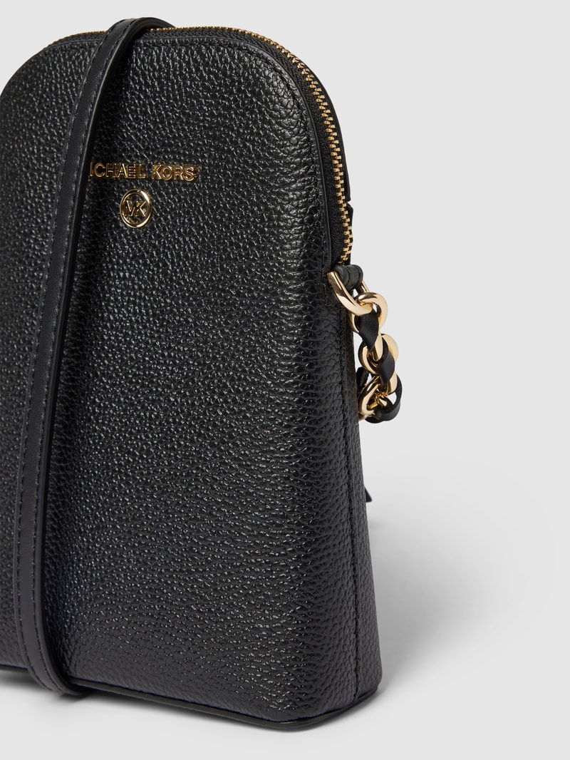 Crossbody Bag mit Label-Applikation Modell 'JET SET CHARM' in schwarz