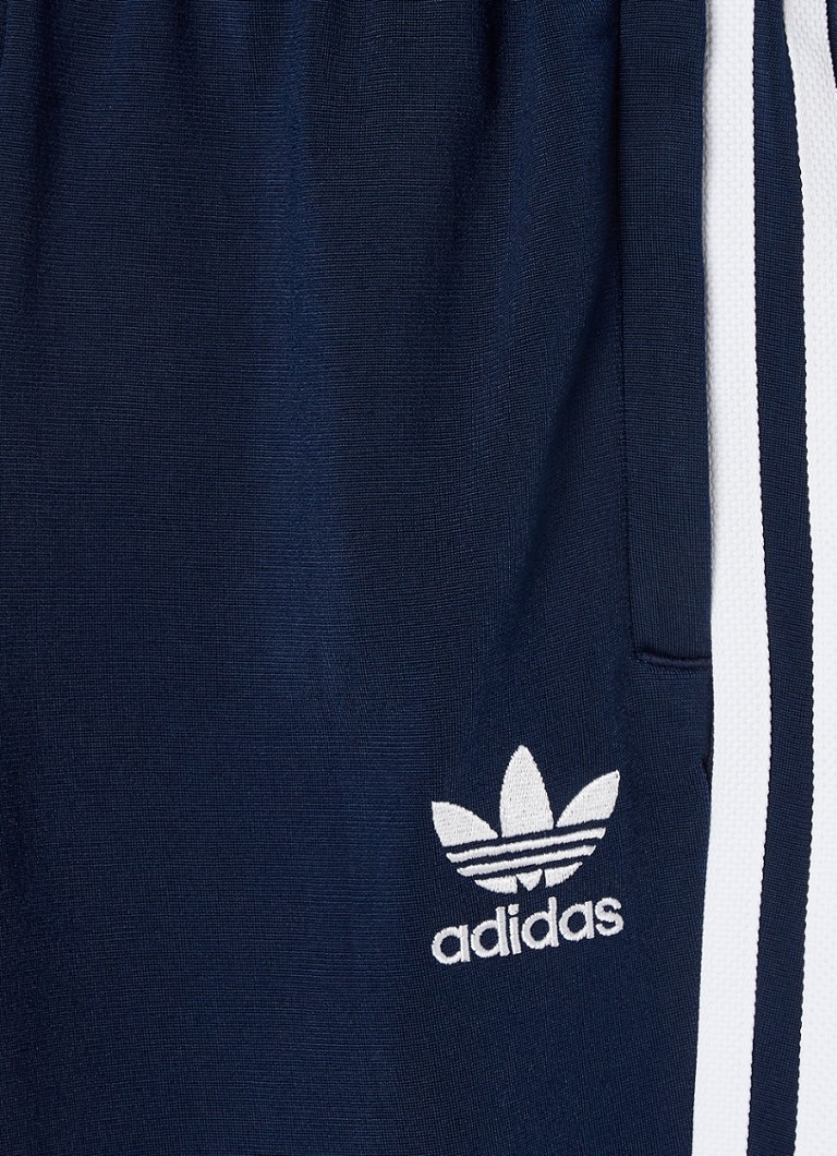 Adidas Superstar kapenevat verryttelyhousut logopainatuksella
