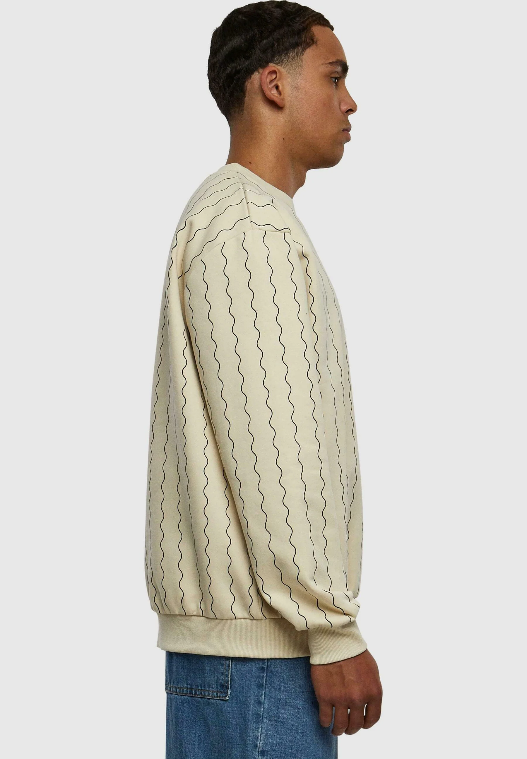 Sudadera Karl Kani con cuello redondo, rayas ziczac y firma pequeña