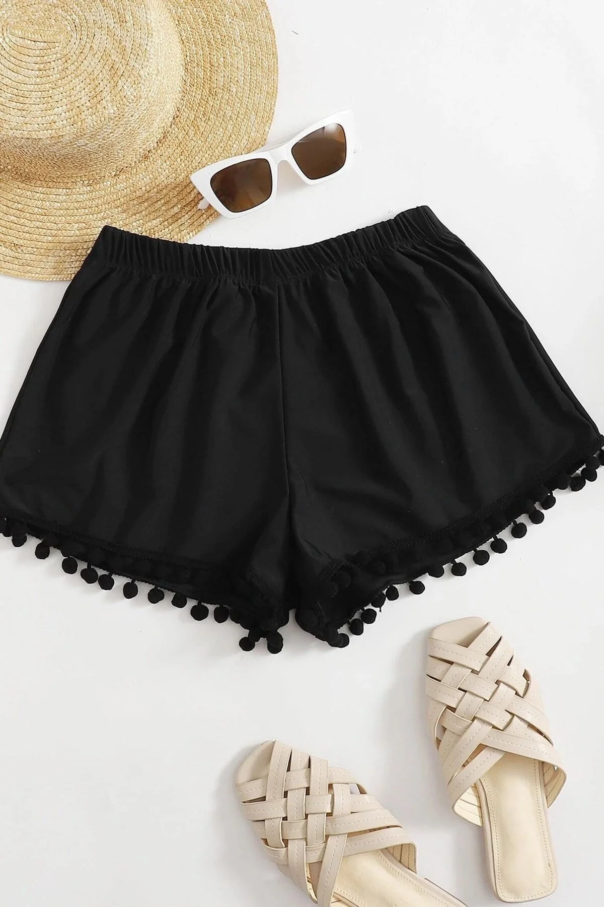 Angelsin  Stylische Badeshorts mit Pompons