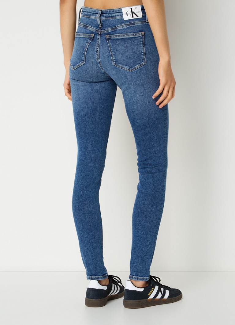 Jeans skinny a vita media Calvin Klein, lavaggio medio