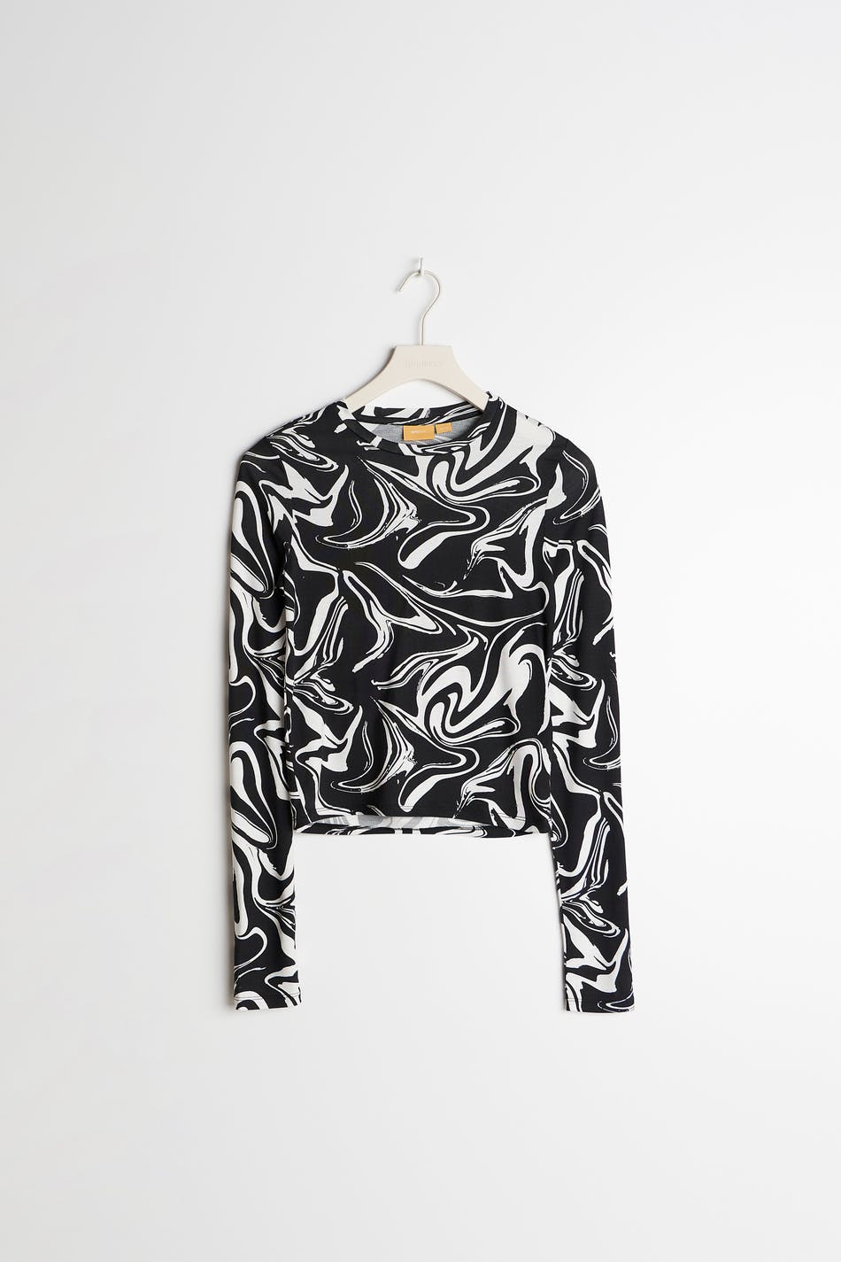S cutout swirl top