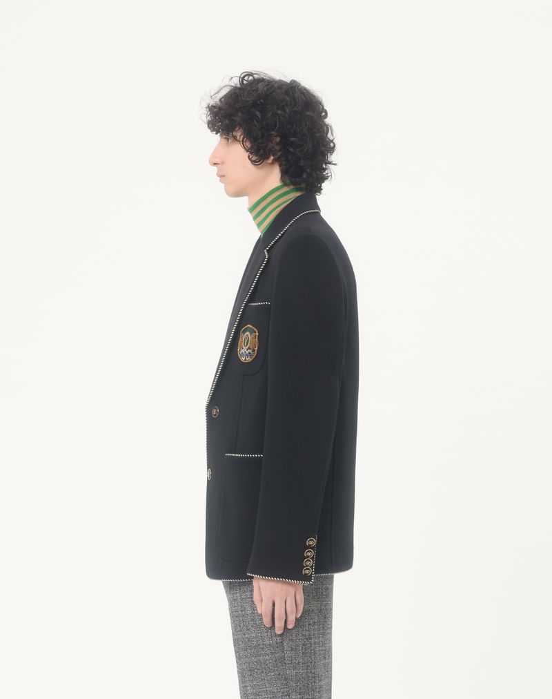 Valentino wollen jas met enkele rij knopen en Valentino-patch