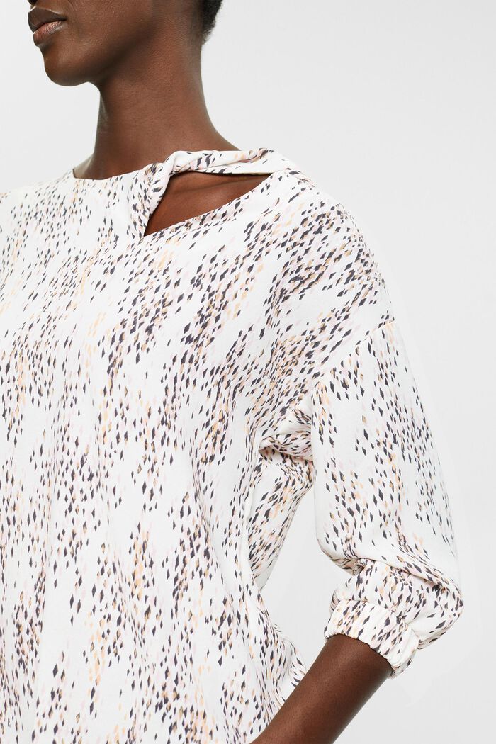Gemusterte Bluse mit Cut-Out-Detail