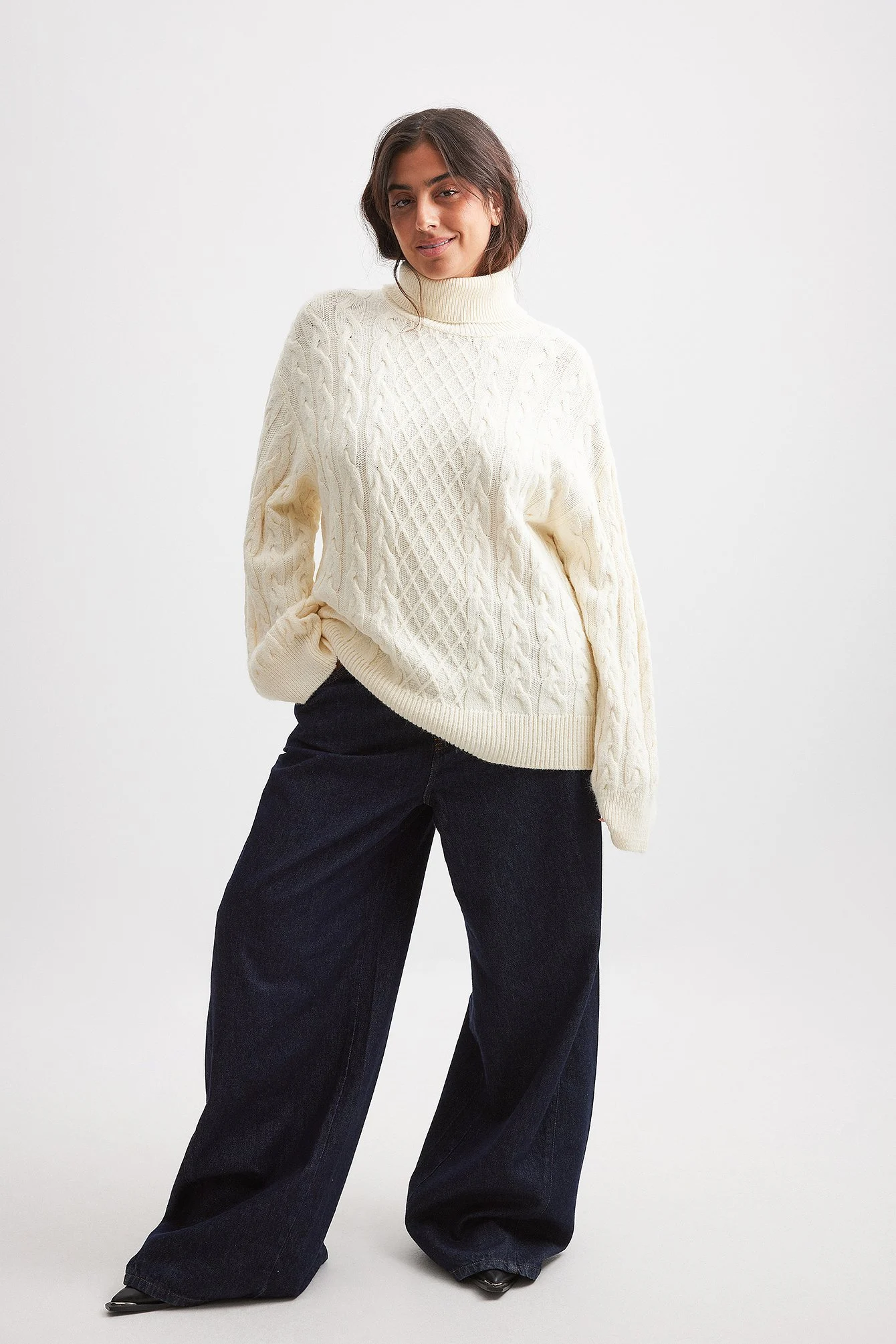 Strickpullover mit Rollkragen und Zopfmuster