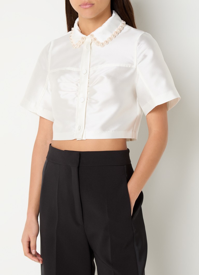 Blusa cropped Sandro em mistura de seda com detalhes em miçangas.