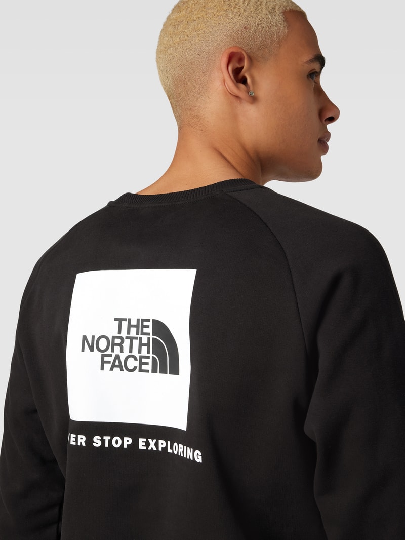 Sweatshirt mit Label-Print Modell 'RAGLAN' in schwarz