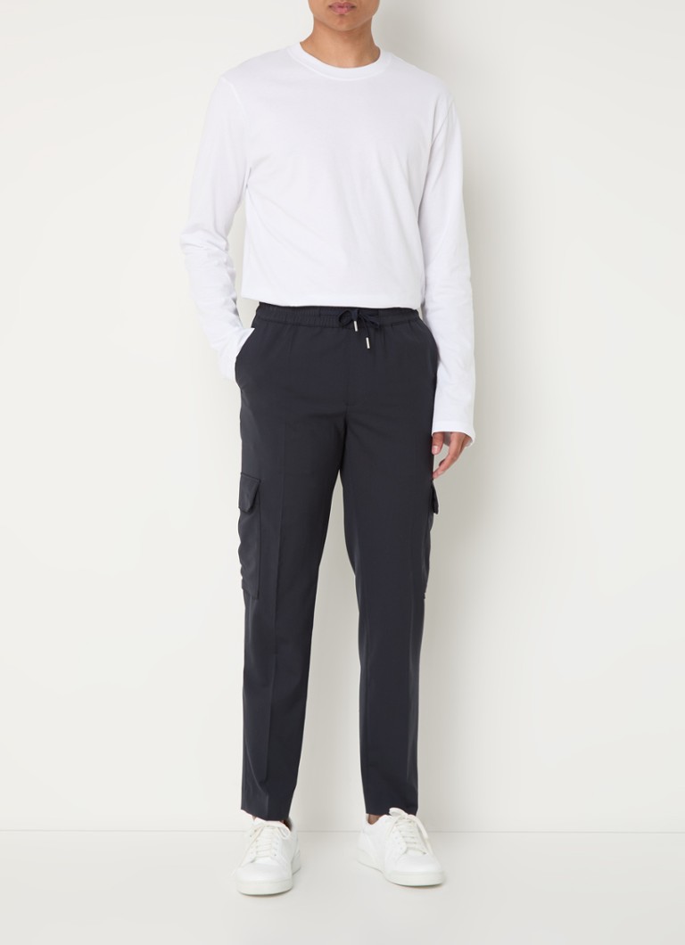 Pantaloni scurți cargo Sandro, mulați, din amestec de lână, cu buzunare cu fermoar.