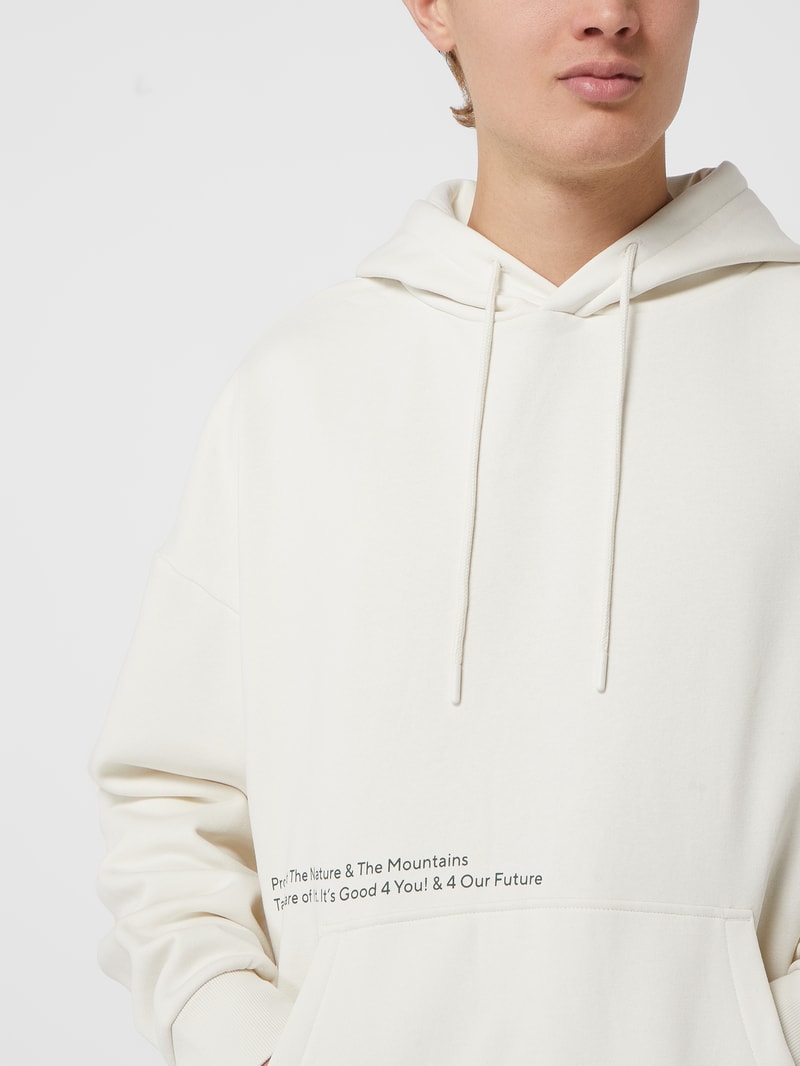 Oversized Hoodie mit Message und Print in offwhite